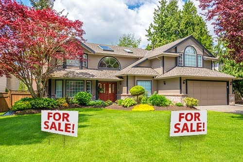 Custom For Sale Yard Signs in front of a house | Banners.com